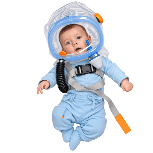 Infant wearing a transparent hood with hose and carry harness