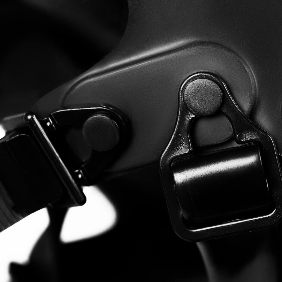 Close-up of Israeli CBRN gas mask adjustable strap latch - secure and customizable head fit
