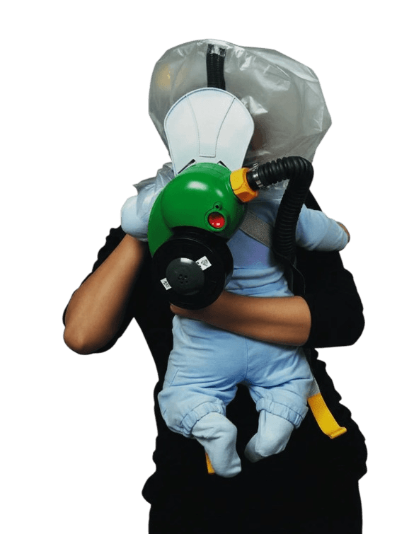 Adult carrying an infant in a hood, viewed from behind