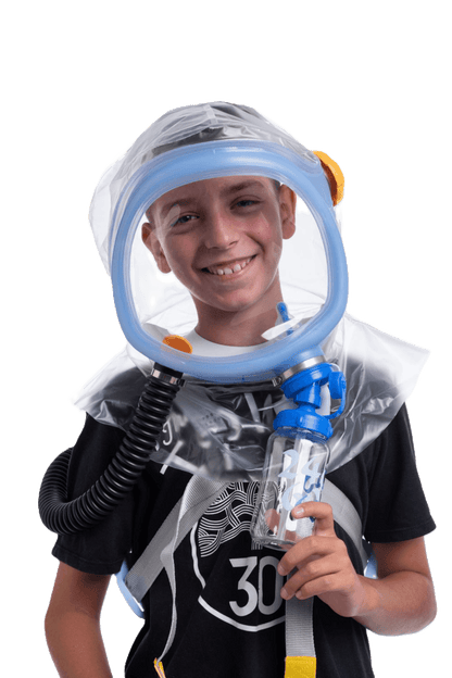 Child wearing a transparent Supergum hood and holding a bottle