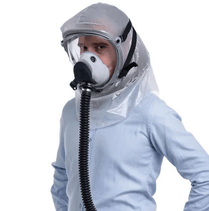 Person wearing a full-body protective suit with a hood and supergum saphir PAPR hood